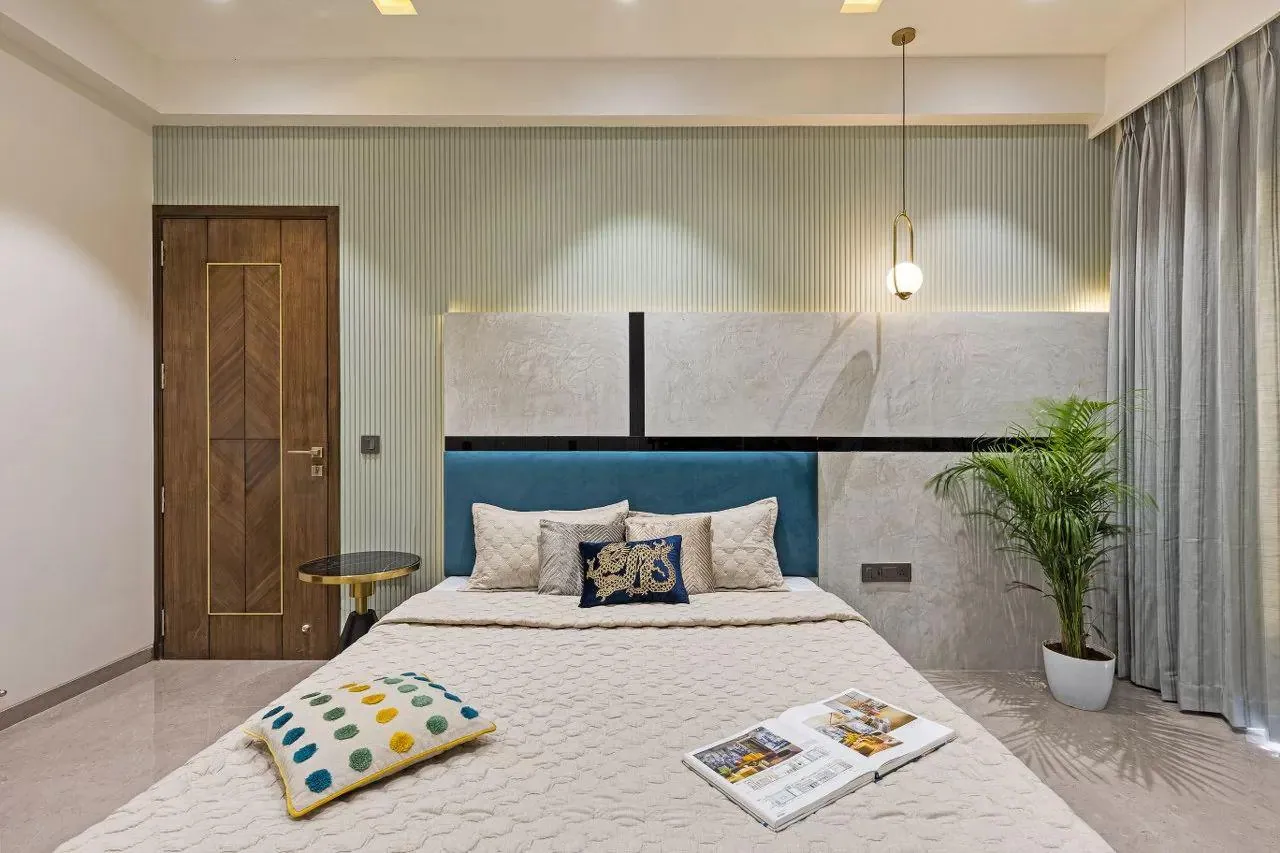 Bedroom with blue headboard